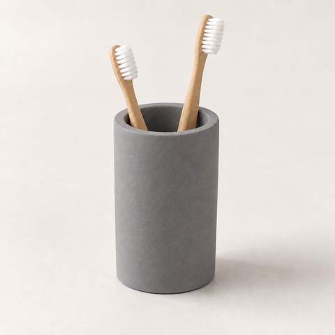 Dark Gray — Dark gray stone brush cup holding two bamboo toothbrushes
