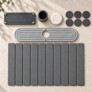 Everything included in the Trivelle Complete Kitchen Set laid out overhead: stone drying mat, sink caddy tray, utensil cup, soap tray, faucet mat and six coasters