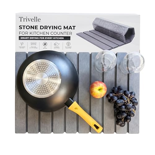 Trivelle stone drying mat with retail box — gray diatomite slats holding a wok, two glasses, an apple, and grapes