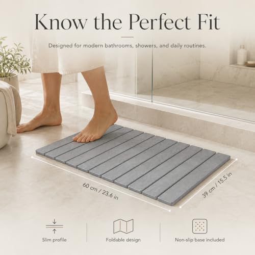 Stone bath mat dimensions — 23.6 by 15.5 inches (60 by 39 cm) with slim profile and non-slip base