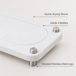 White — White stone sink caddy features: quick-drying stone, holds 4 bottles, elevated stainless steel legs