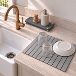 Dark Gray — Dark gray stone sink caddy beside the Trivelle stone drying mat by a farmhouse sink