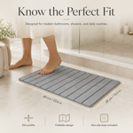 Stone bath mat dimensions — 23.6 by 15.5 inches with slim non-slip profile