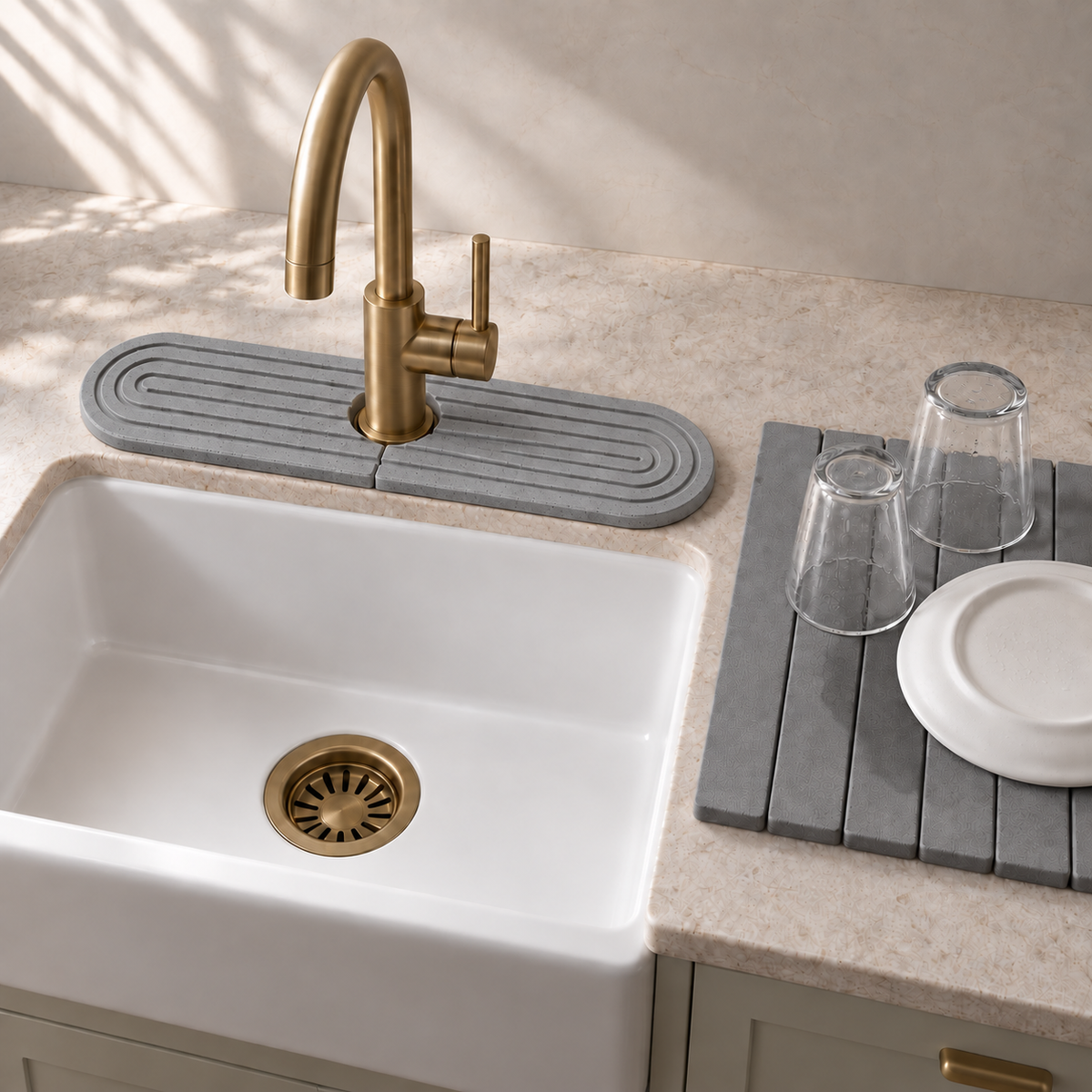 Dark Gray — Dark gray stone faucet mat beside a farmhouse sink and the Trivelle stone drying mat