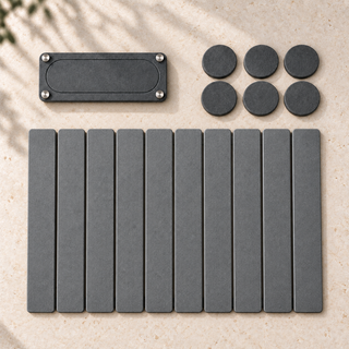Everything in the Trivelle Essential Kitchen Set laid flat: the stone drying mat, the stone sink caddy and six stone coasters